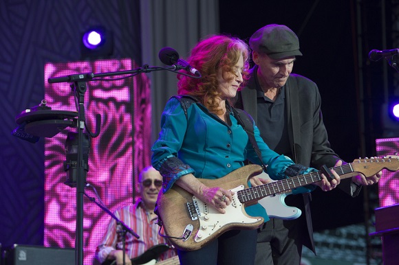 BOSTON, MA - AUGUST 6: James Taylor and Bonnie Raitt perform at a sold out show on August 6, 2015 at Fenway Park in Boston, Massachusetts. (Photo by Michael Ivins for James Taylor)