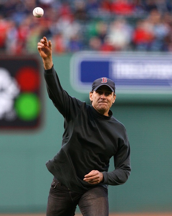 BOSTON - MAY 24:  Singer James Taylor throws out the first pitch before the game between the New York Yankees and the Boston Red Sox on May 24, 2006 at Fenway Park in Boston, Massachusetts.  (Photo by Al Bello/Getty Images)